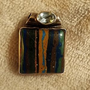 - Rainbow calsilica and blue topaz pendant